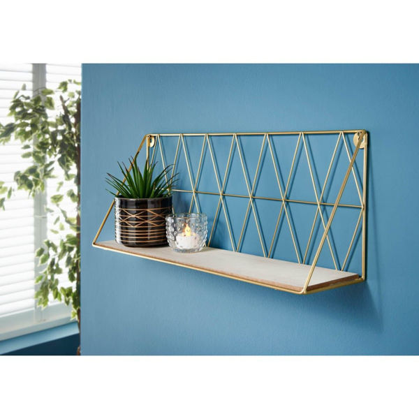 Picture of gold decorative shelving.